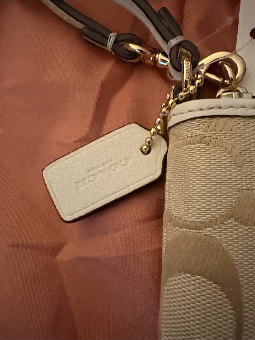 Coach Beige Signature Zip Wristlet with Gold Hardware